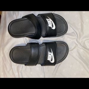 Woman’s Nike slides